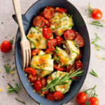 Ravioli di zucchine con ricotta, funghi porcini e pomodorini